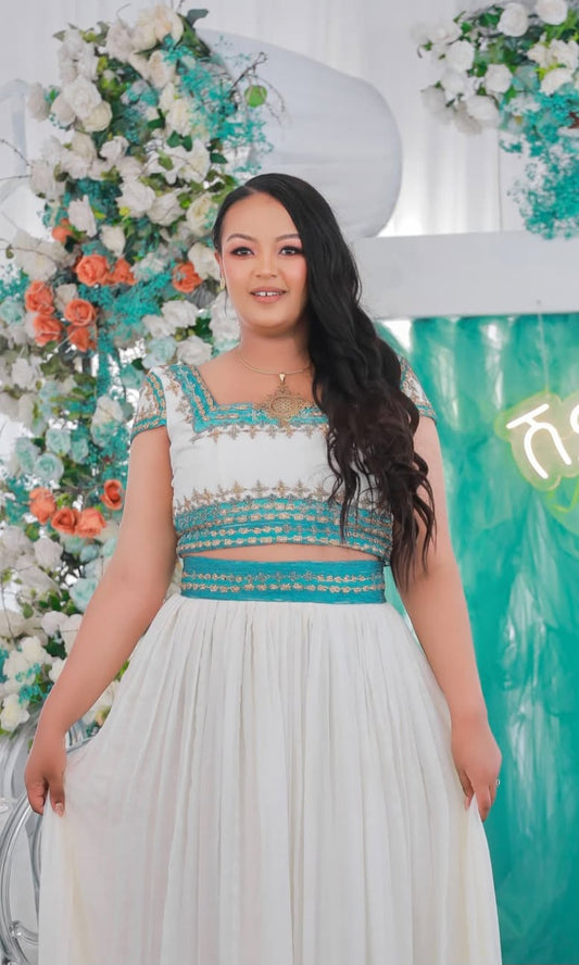 Vibrant Habesha Kemis with Blue Tibeb – Ethiopian Traditional Dress for special occasion