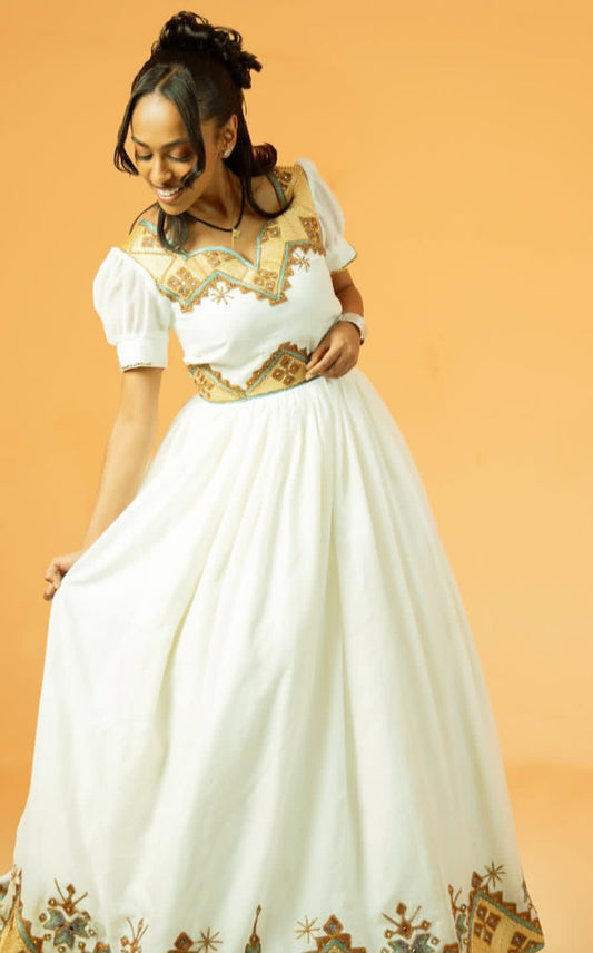 Traditional Ethiopian Dress – White Habesha Kemis with Gold Tibeb Design