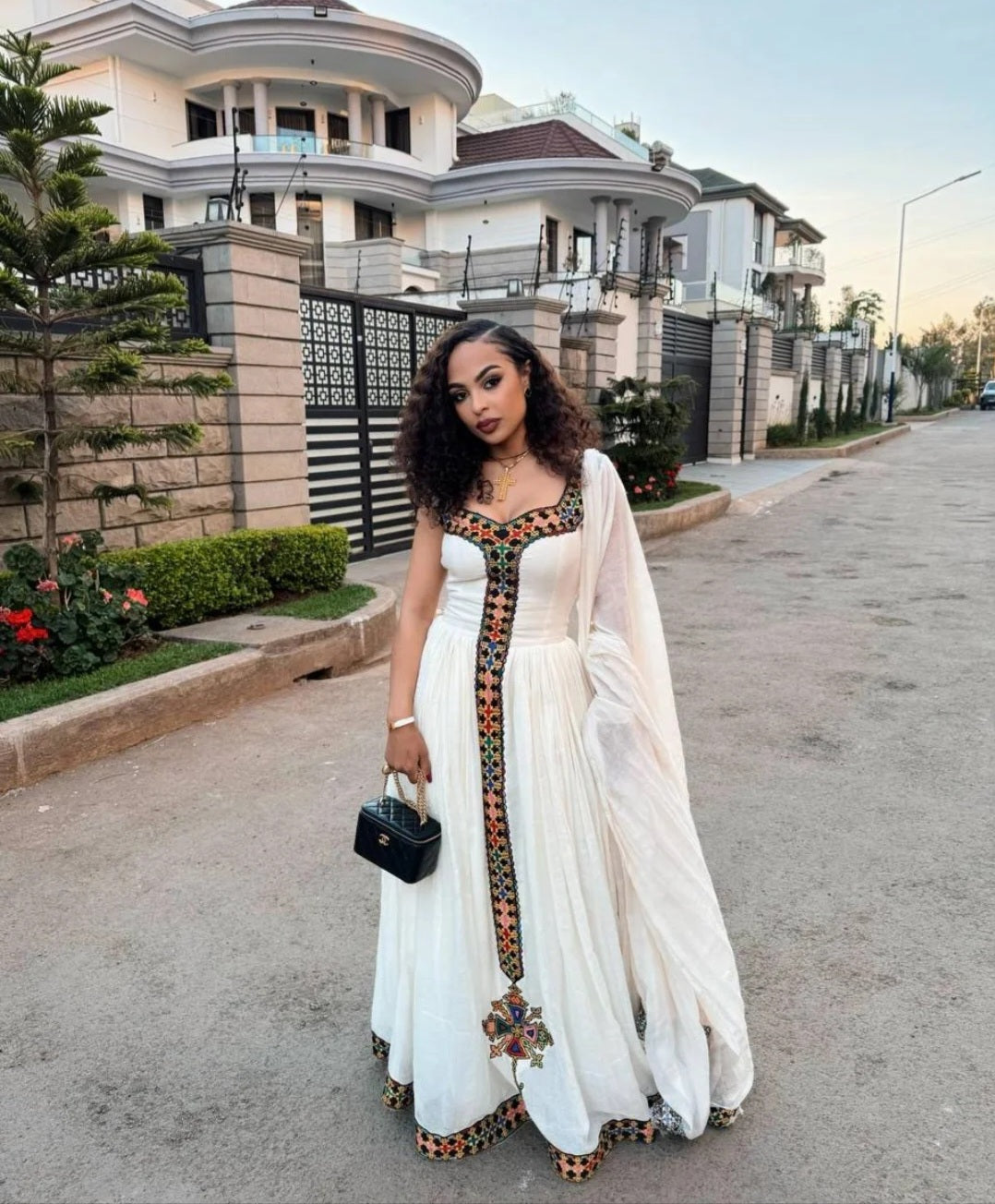 White Habesha Kemis with Vibrant Tibeb – Modern Ethiopian Traditional Dress