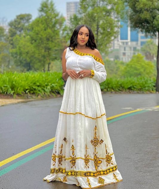 Elegant Habesha Kemis with Gold Tibeb β Handmade Ethiopian Dress for Celebrations