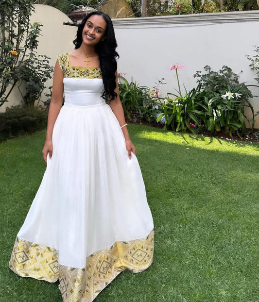 White Habesha Dress with Gold Tibeb β Beautiful Ethiopian Traditional Dress