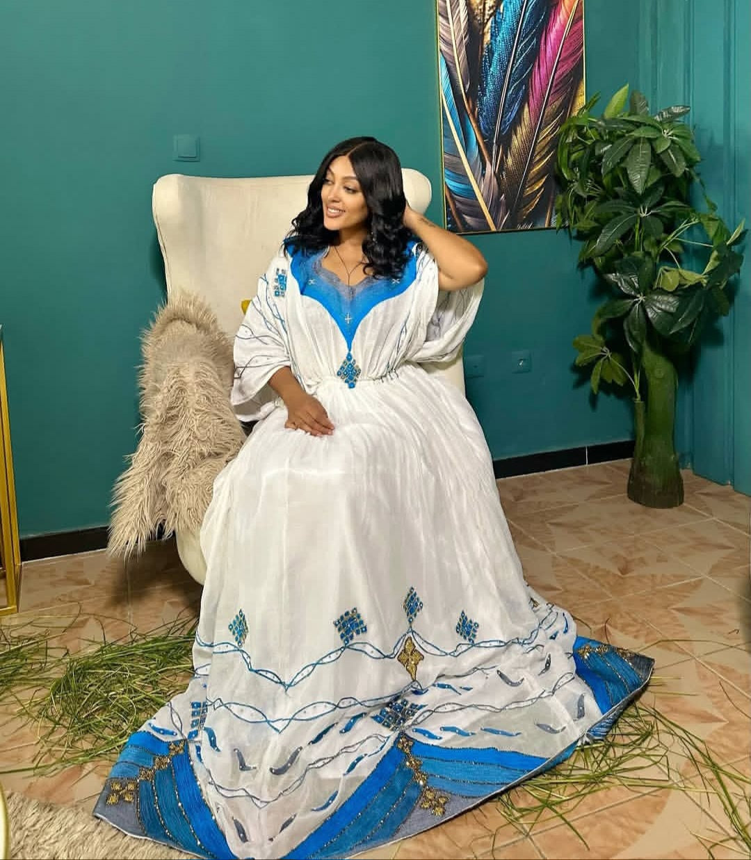 White Habesha kemis with Blue Tibeb – Ethiopian Traditional Dress for Special Occasions
