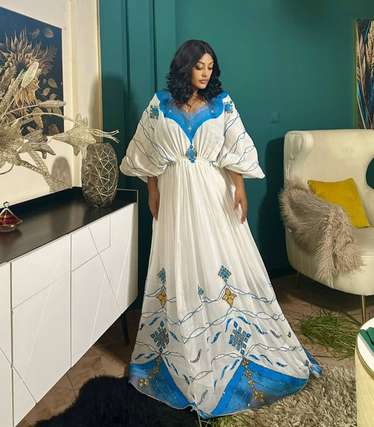 White Habesha kemis with Blue Tibeb β Ethiopian Traditional Dress for Special Occasions