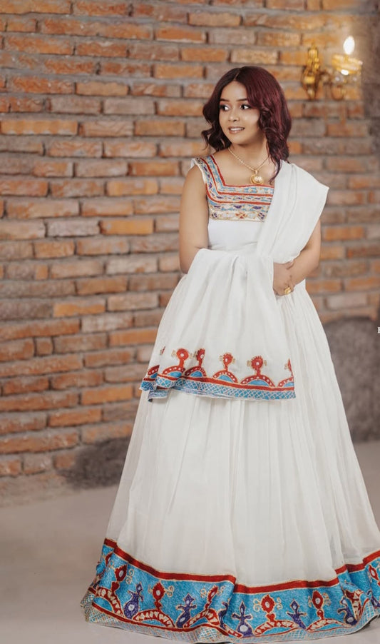Elegant Ethiopian White Dress with Colorful Embroidery - stunning habesha kemis