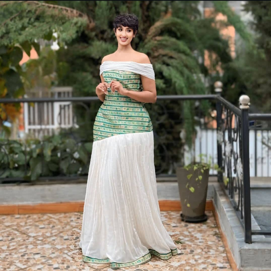 White & Green Habesha Kemis – Modern Ethiopian Dress with new design