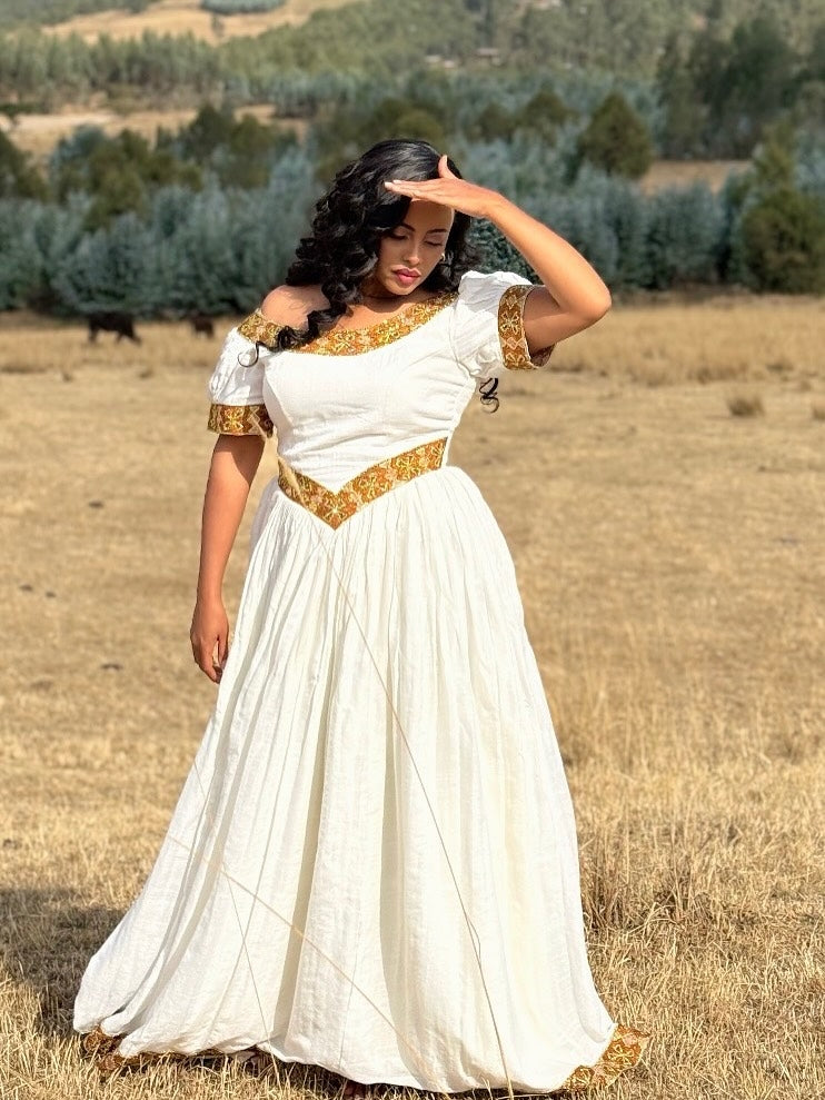 Gold Habesha Zuria – Traditional Ethiopian Dress for Cultural Celebrations and Elegant Occasions