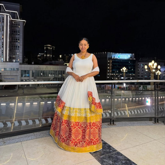 Red and Gold Habesha Kemis – Elegant White Traditional Ethiopian Dress with Vibrant Hand-Embroidered Borders for Special Events and Cultural Holidays