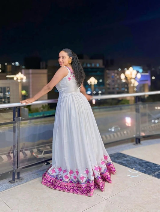 Pink Habesha Kemis β Traditional Ethiopian Dress with Handwoven Borders