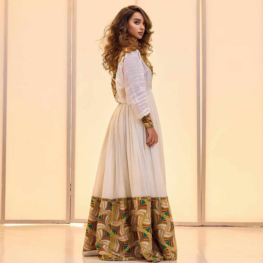 Gold Tones Habesha Kemis – The Celebration Collection for holidays by Tsehaye Mehari