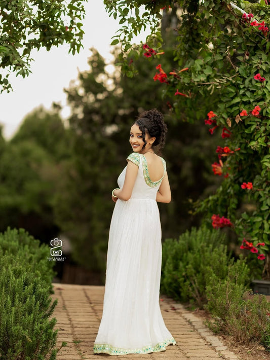 Green Habesha Kemis – Simple Sleeveless Ethiopian Traditional Dress for Cultural Gatherings and Everyday Elegance