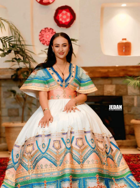 White Ethiopian Kemis – Elegant Traditional Dress with Pleated Skirt and Colorful Hand-Embroidered Patterns