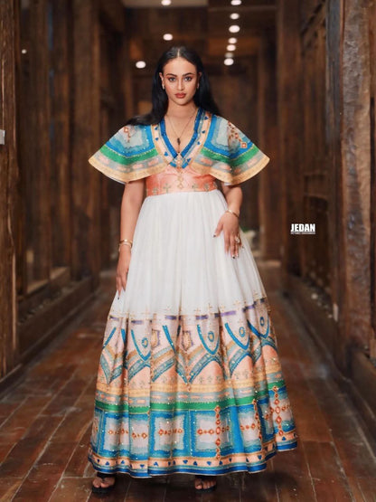 White Ethiopian Kemis – Elegant Traditional Dress with Pleated Skirt and Colorful Hand-Embroidered Patterns