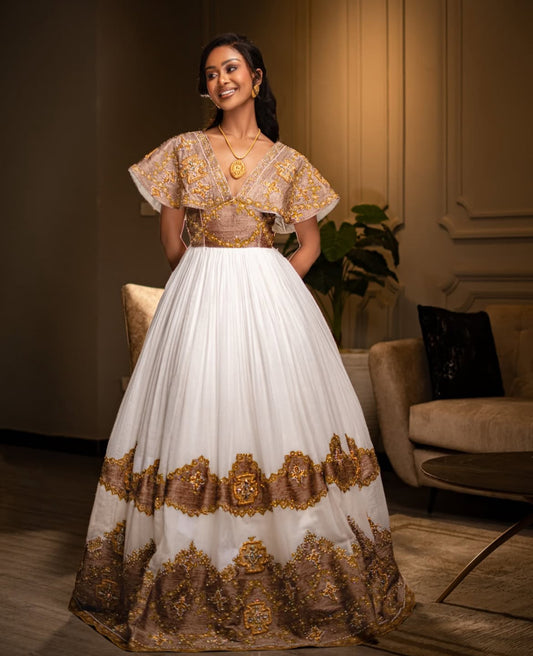 Elegant White & Brown Habesha Wedding Dress – Handwoven with Traditional Tibeb