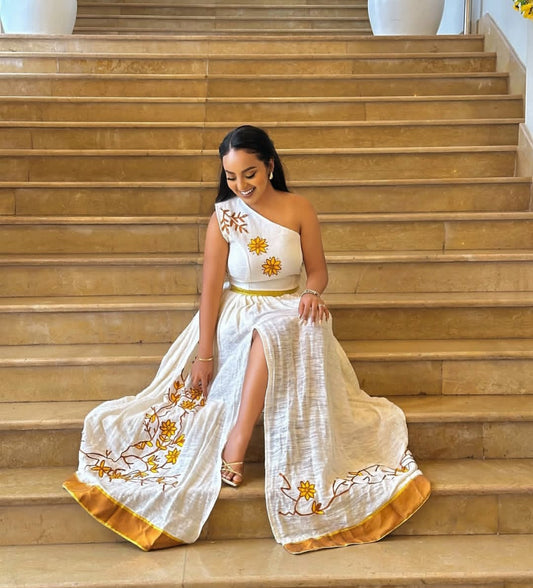 Elegant Habesha Dress with Gold Embroidery – One-Shoulder Ethiopian Dress