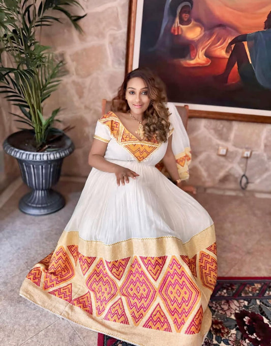 Elegant Habesha Dress with Orange Tibeb – Vibrant Ethiopian Traditional Dress