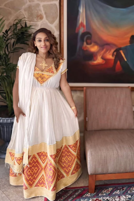 Elegant Habesha Dress with Orange Tibeb – Vibrant Ethiopian Traditional Dress