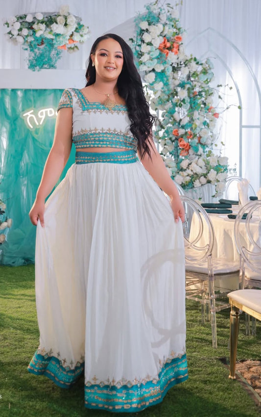 Vibrant Habesha Kemis with Blue Tibeb – Ethiopian Traditional Dress for special occasion