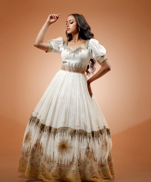 Elegant White Habesha Dress with Gold Embroidery – Handwoven Ethiopian Kemis