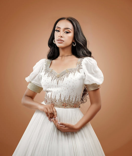 Elegant White Habesha Dress with Gold Embroidery – Handwoven Ethiopian Kemis