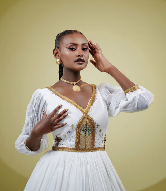 Regal White Habesha Dress with Gold Cross Embroidery – Ethiopian Kemis