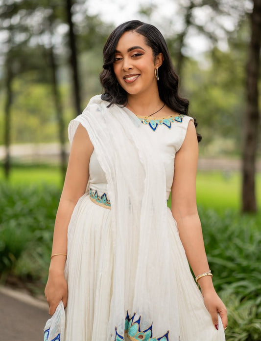 Traditional Ethiopian Dress with Bold Blue Tibeb – Classic Habesha Kemis