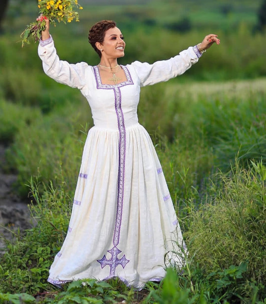 Modern Ethiopian Dress – White Habesha Kemis with Elegant Purple Tibeb Design