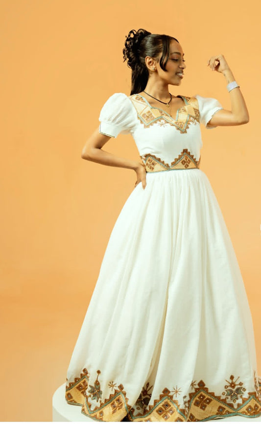 Traditional Ethiopian Dress – White Habesha Kemis with Gold Tibeb Design