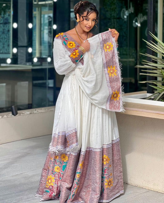 Modern Habesha Kemis with purple Floral Tibeb – Handmade Ethiopian Dress