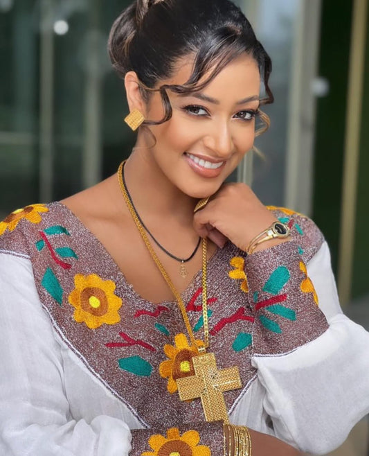 Modern Habesha Kemis with purple Floral Tibeb – Handmade Ethiopian Dress