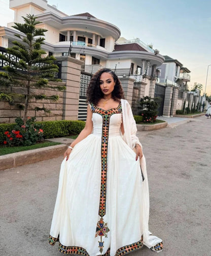 White Habesha Kemis with Vibrant Tibeb – Modern Ethiopian Traditional Dress