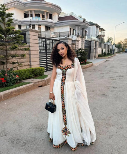 White Habesha Kemis with Vibrant Tibeb – Modern Ethiopian Traditional Dress