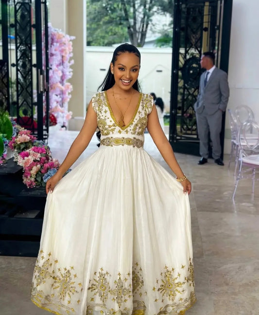 White Habesha Dress with Gold Embroidery – Festive Ethiopian Kemis