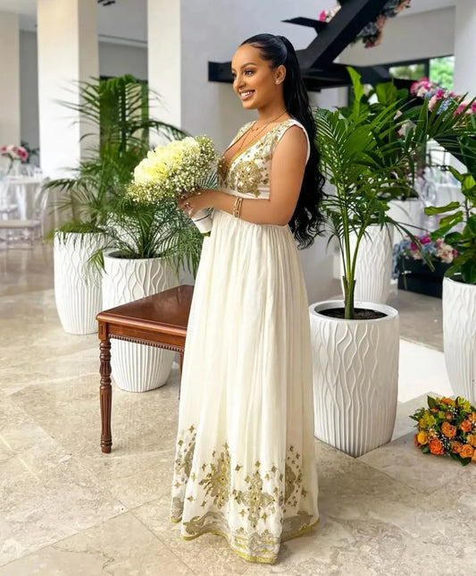White Habesha Dress with Gold Embroidery – Festive Ethiopian Kemis