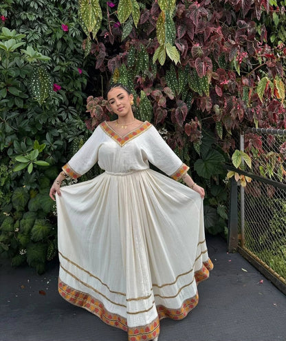 Elegant Habesha Dress with Gold Tibeb – Ethiopian Dress Style