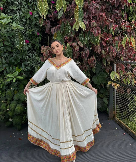 Elegant Habesha Dress with Gold Tibeb – Ethiopian Dress Style