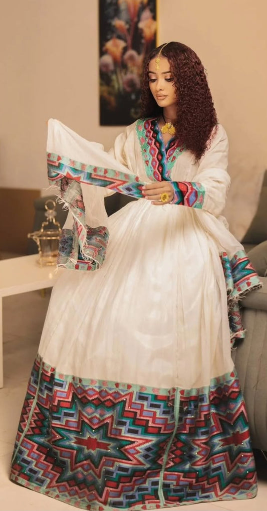 Vibrant Habesha Dress with Geometric Tibeb – Colorful Ethiopian Traditional Dress