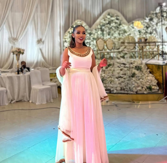 Elegant Habesha Wedding Dress with Gold Trim – Ethiopian Bridal Kemis