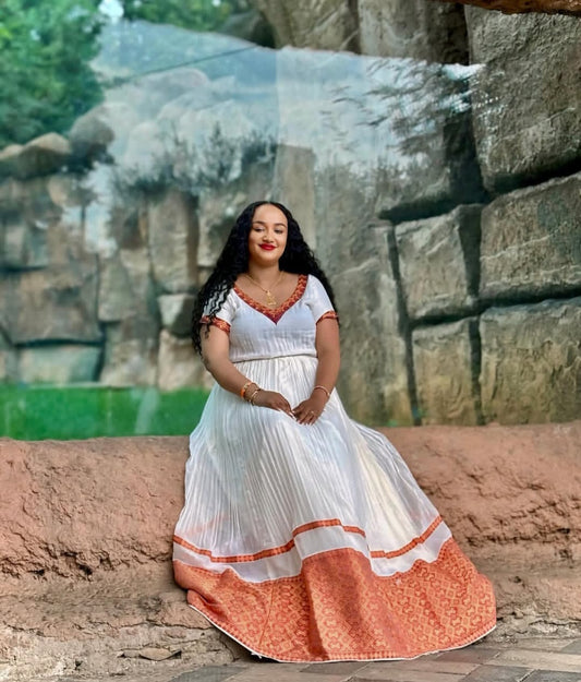 Simple & Elegant Habesha Kemis with Orange Tibeb – Versatile Ethiopian Dress