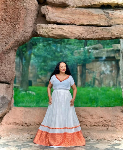 Simple & Elegant Habesha Kemis with Orange Tibeb – Versatile Ethiopian Dress