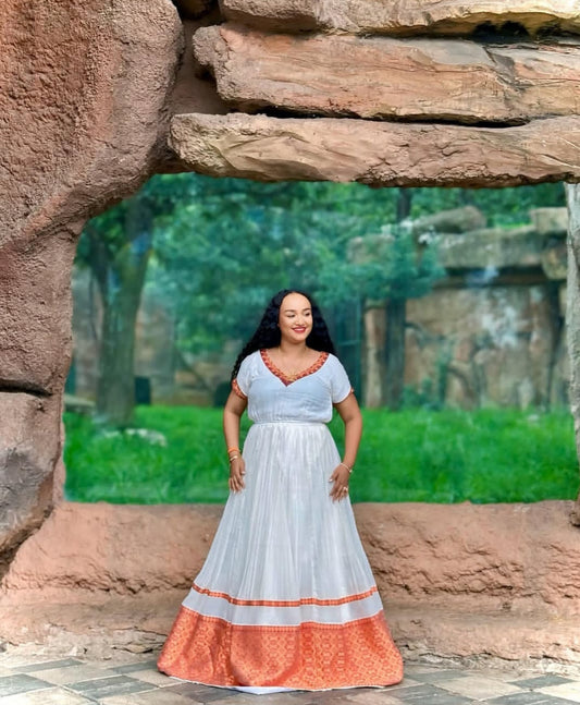 Simple & Elegant Habesha Kemis with Orange Tibeb – Versatile Ethiopian Dress