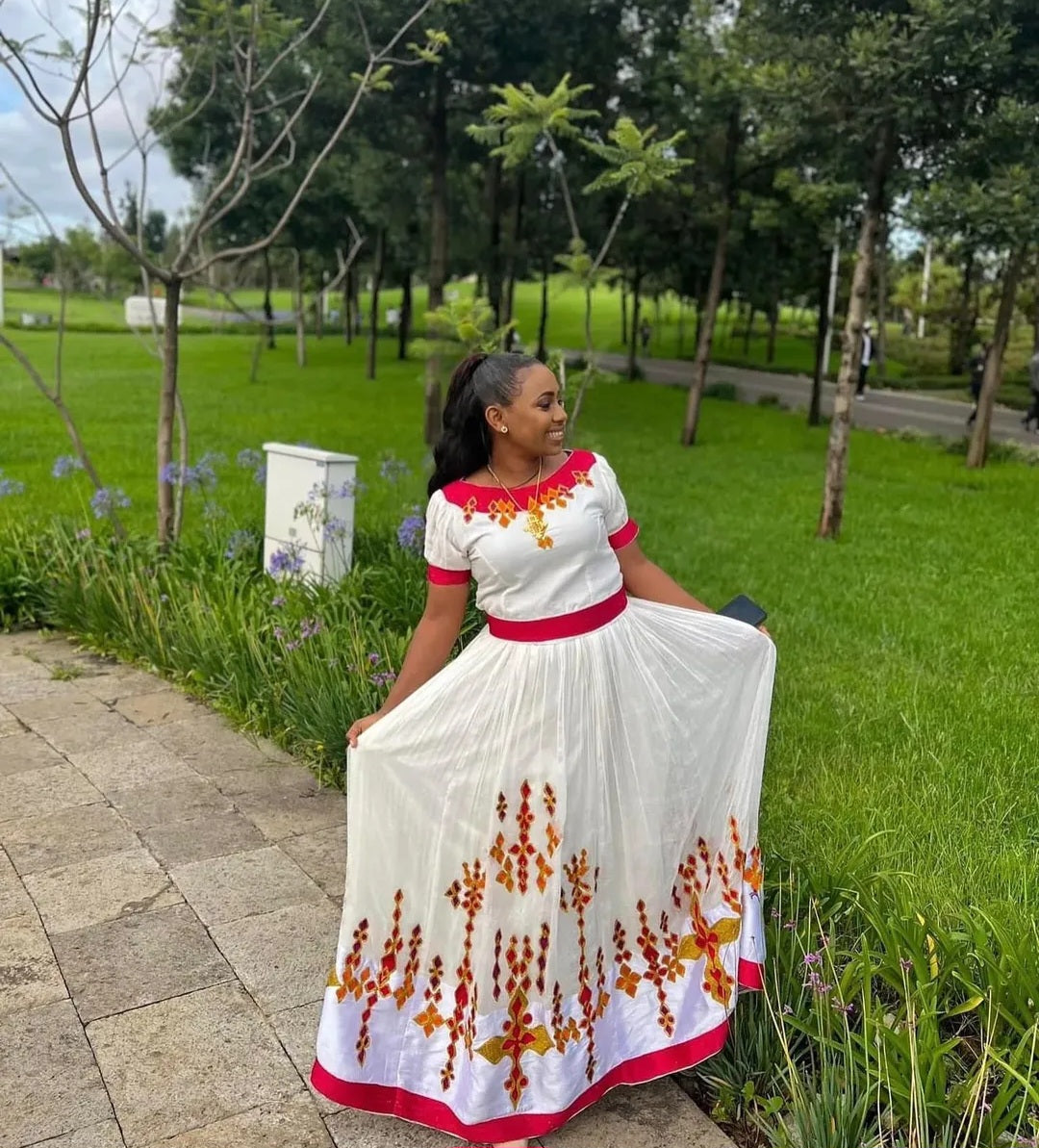 Modern Habesha Dress with Red Accents – Stylish Ethiopian Kemis