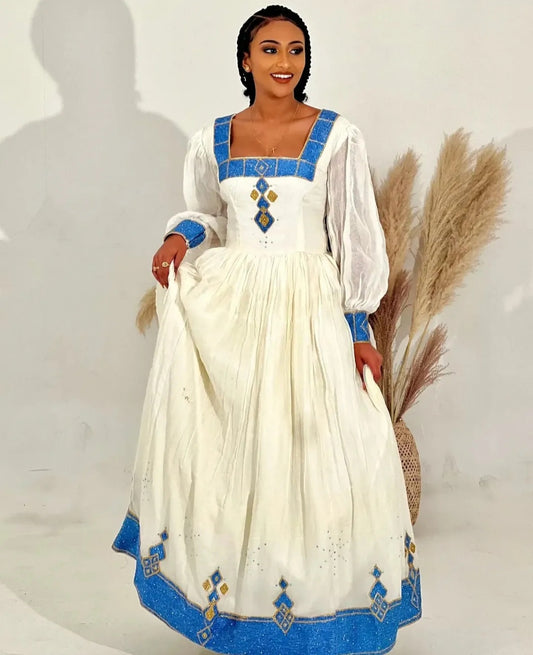 White Habesha Dress with Blue Tibeb – Elegant Ethiopian Traditional Dress