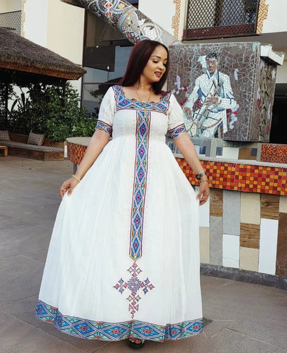White Habesha Dress with Blue Tibeb – Artistic Ethiopian Traditional Dress