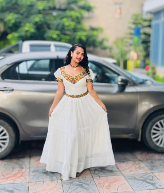 White Habesha Kemis with Colorful Neckline – Stylish Ethiopian Dress