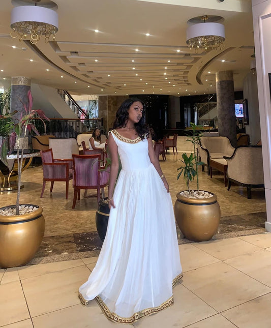 Simple White Habesha Kemis with Gold Border – Elegant Ethiopian Dress