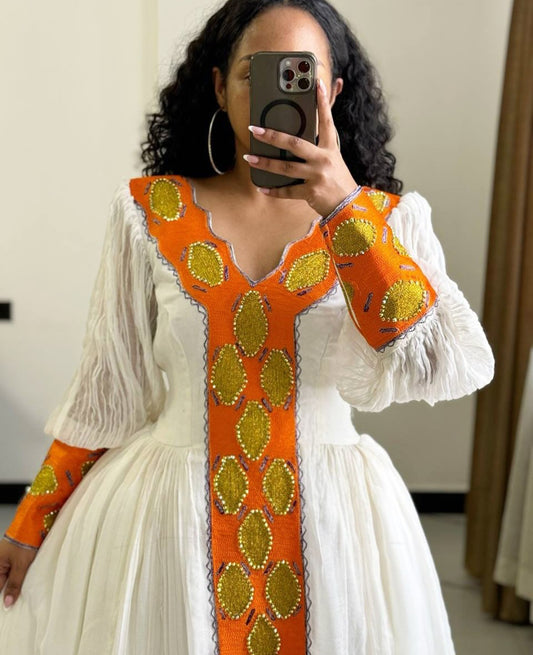 Colorful Habesha Kemis with Orange Tibeb – Handmade Ethiopian Dress for Celebrations