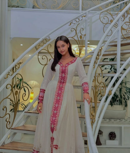 Elegant Habesha Kemis with Pink & Gold Tibeb – Classic Ethiopian Dress