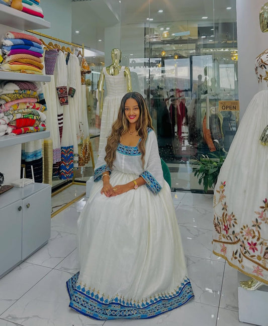 Traditional Habesha Kemis with Blue Tibeb – Handwoven Ethiopian Dress for Women