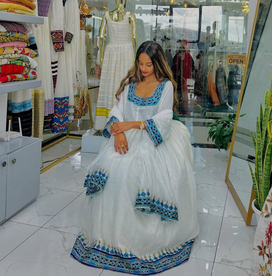 Traditional Habesha Kemis with Blue Tibeb – Handwoven Ethiopian Dress for Women