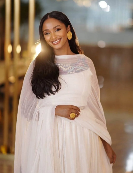 Vibrant Habesha Dress with  Purple Tibeb – Unique Ethiopian Traditional Dress